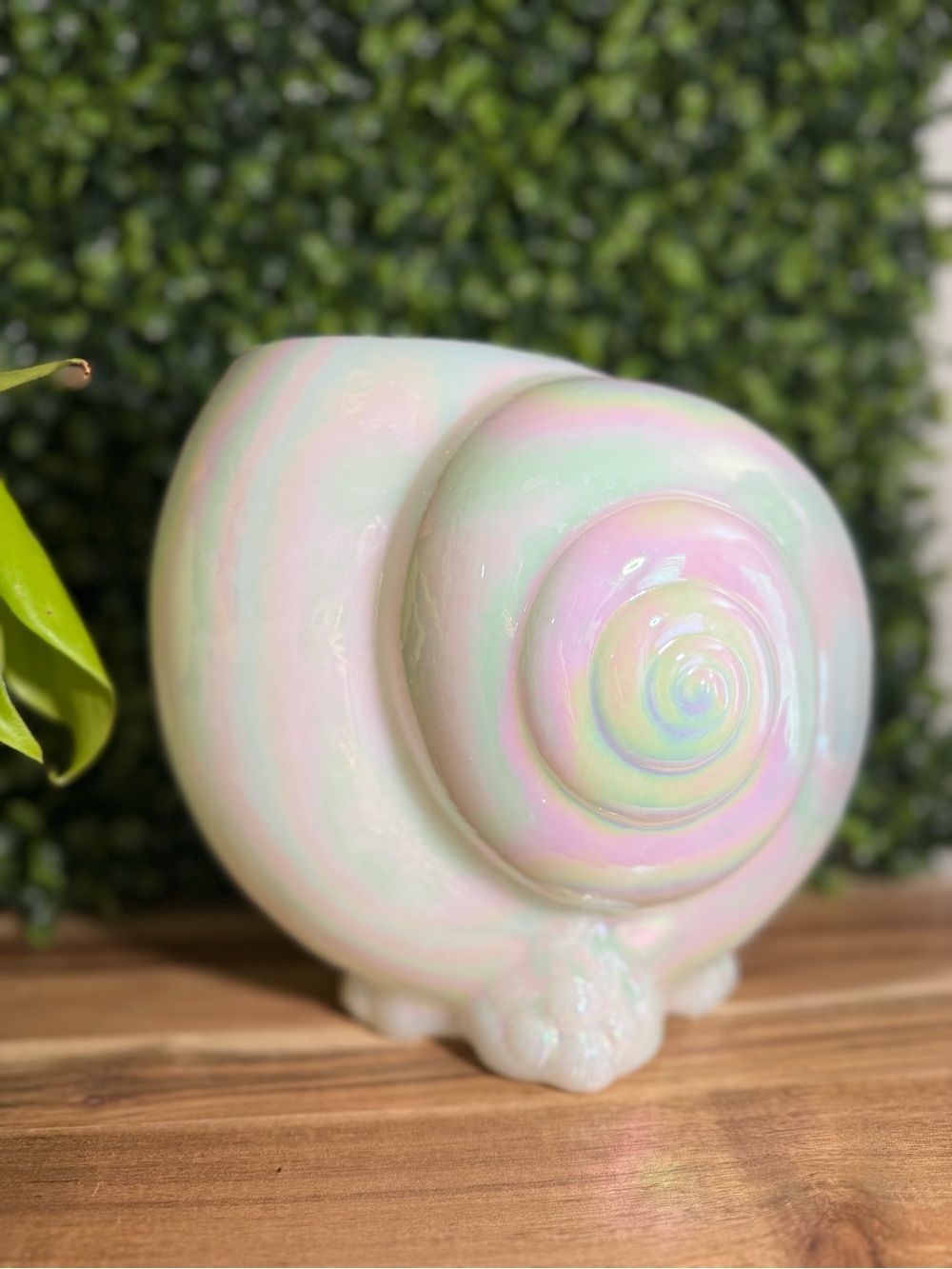 Vintage Fenton Art Glass nautilus shell vase in an iridescent opalescent finish